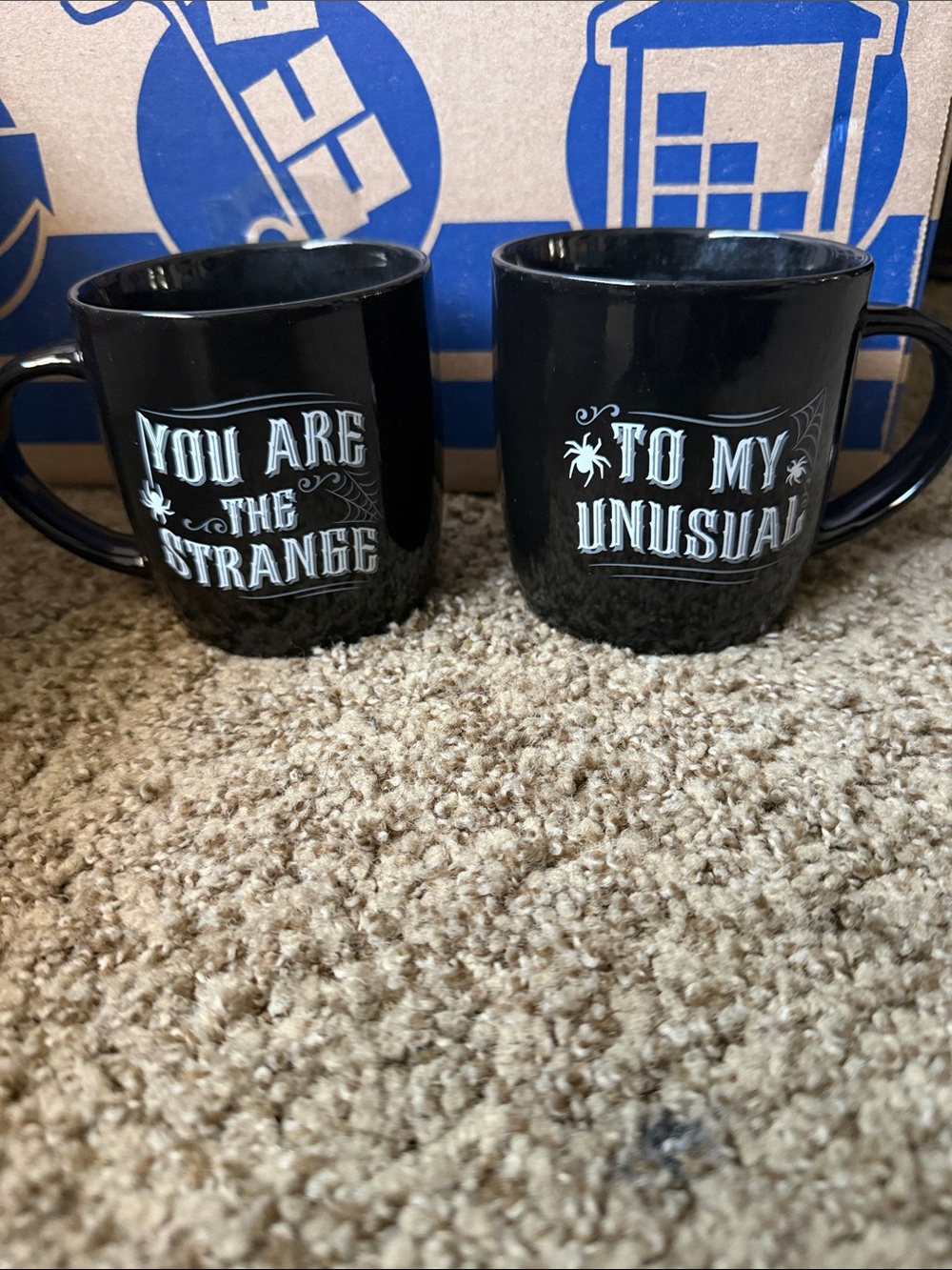 Black Ceramic Mug Pair - 'You Are the Strange' and 'To My Unusual'